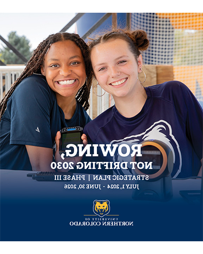 Strategic plan front cover, two female presenting students in UNC tshirts.